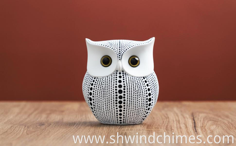 owl statues to scare birds